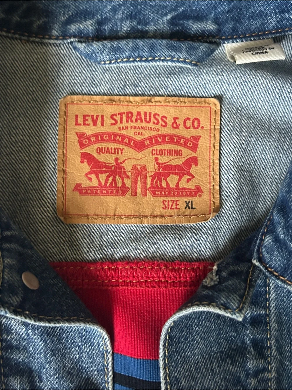 Men’s Levi's Blue Denim Trucker Jacket with Red Trim